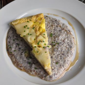 Redbook Restaurant - Cheddar frittata with grits - American Near Me - Charles Town, West Virginia Redbook Restaurant - Cheddar frittata with grits - American Near Me - Charles Town, West Virginia