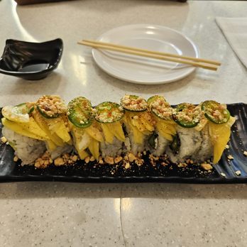 Kakuna Sushi - Vegetarian mango roll ($14.99): asparagus, cream cheese, and avocado on the inside, mango, jalapeno, honey, tajin, and nuts on outside - Sushi Bars Near Me - San Leandro, California