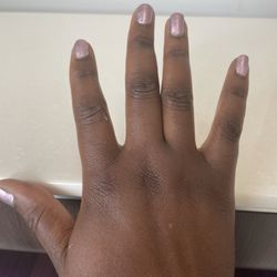 Newyork Nails & Spa - I asked for gel and she painted them with regular polish. Even that was sloppy and horrible.