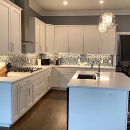 Beautiful kitchen remodel that completely reconfigured the kitchen to make it larger and more efficient. David Doughton design. Beautiful kitchen remodel that completely reconfigured the kitchen to make it larger and more efficient. David Doughton design.