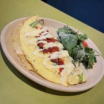 Snooze, an A.M. Eatery - Avocado omlette - Breakfast & Brunch Near Me - Tustin, California Snooze, an A.M. Eatery - Avocado omlette - Breakfast & Brunch Near Me - Tustin, California