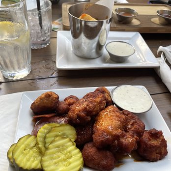 Hennessey's La Jolla - Cheese curds & chicken bites from the HH menu. - New American Near Me - La Jolla, California Hennessey's La Jolla - Cheese curds & chicken bites from the HH menu. - New American Near Me - La Jolla, California