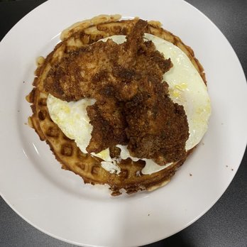 Poached - The BEST chicken and waffles with syrup! Egg was over easy - Breakfast & Brunch Near Me - Hot Springs, Arkansas