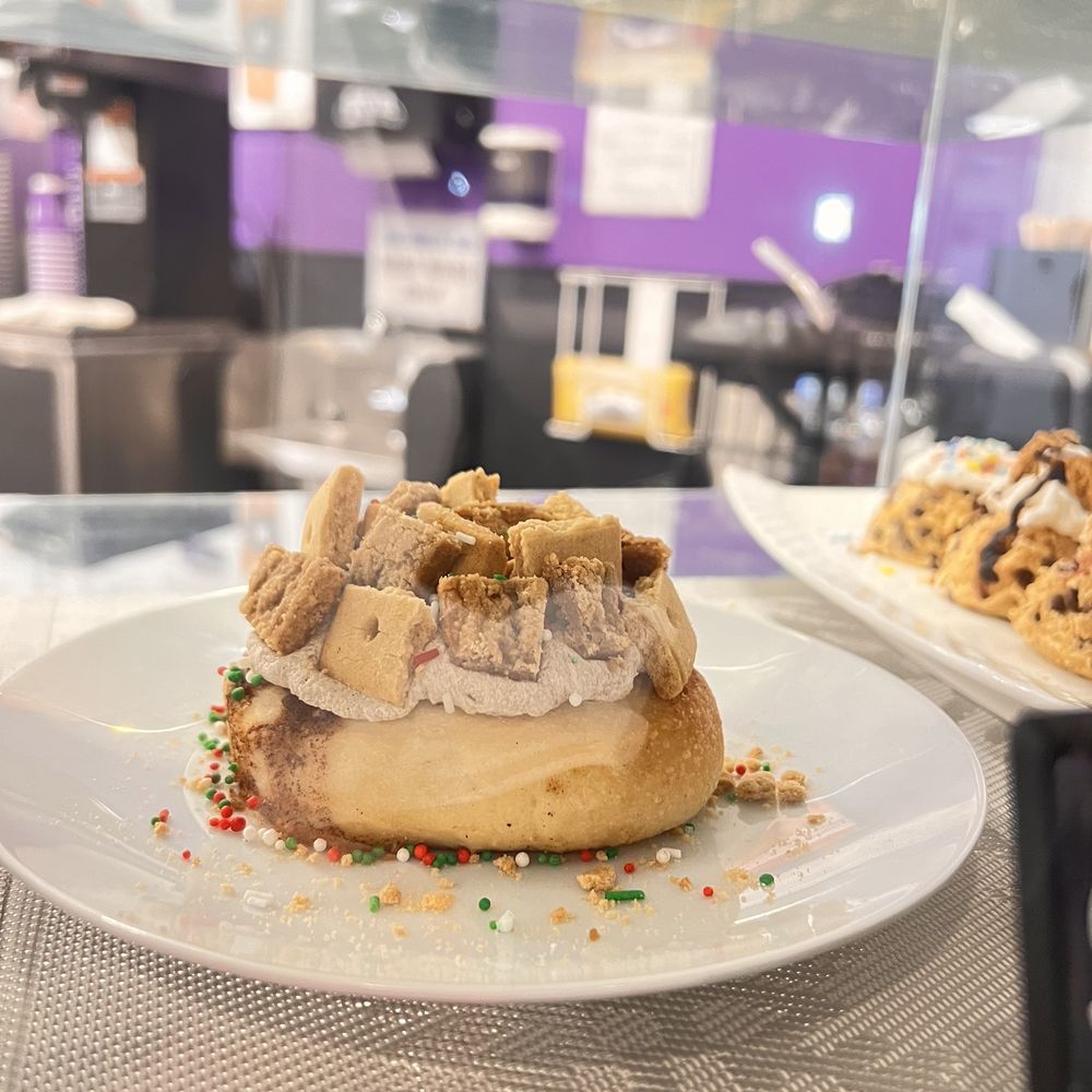 Cinnaholic - two plates of food on a table - Bakeries Near Me - Toronto, Ontario Cinnaholic - two plates of food on a table - Bakeries Near Me - Toronto, Ontario