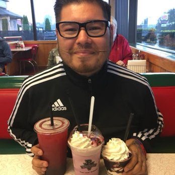 Burgerville - Marionberry lemonade, shake, and sundae. For reference he doesn't smile for photos often but this managed to crack this tough nut. - Burgers Near Me - Centralia, Washington