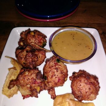 Bahama Breeze - Conch Fritters appetizer-- rather flavorless:( - Bars Near Me - Gainesville, Florida