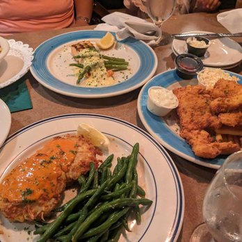Elmo's Dockside - Crab cakes ( front) salmon ( back) and fish and chips on the side right - Seafood Near Me - Vernon, Connecticut