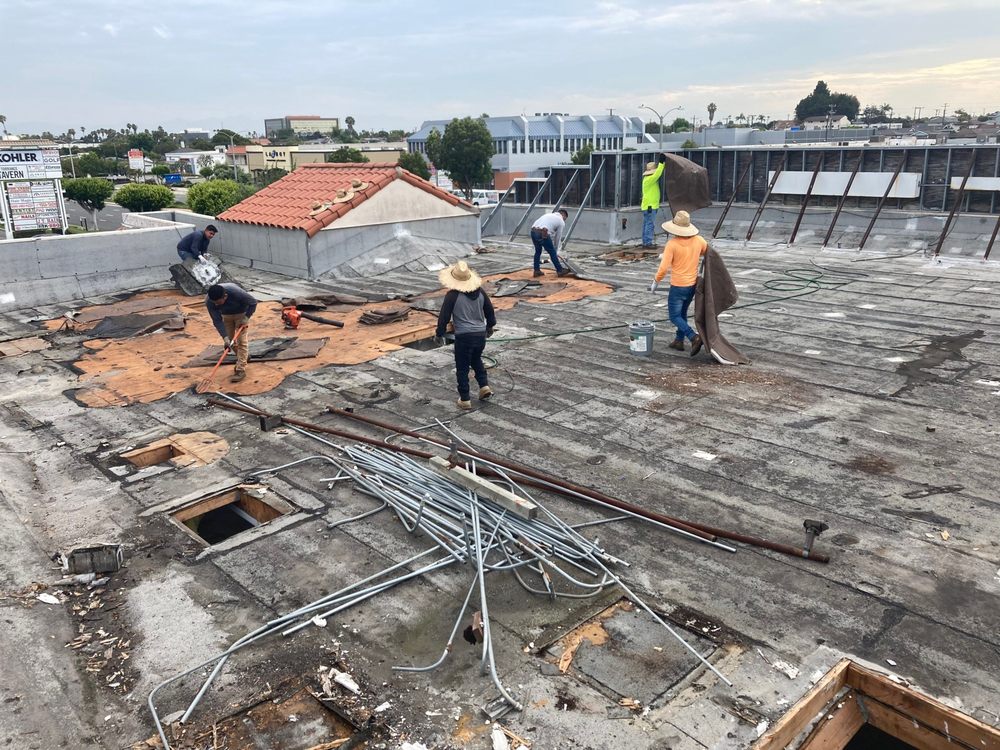 Slide of Wences Roofing Team