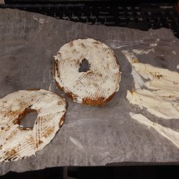 two bagels on a piece of wax paper