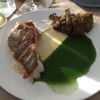 Perry St - Pan seared Black Sea bass with lemon and basil sauce - New American Near Me - New York, New York Perry St - Pan seared Black Sea bass with lemon and basil sauce - New American Near Me - New York, New York