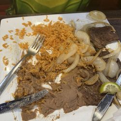 El Rey Azteca Mexican Restaurant - Beans supposably? And days old carne asada.