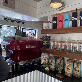 Zanders Coffee - a red coffee machine in a coffee shop - Coffee Roasteries Near Me - Coarsegold, California