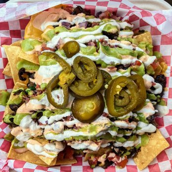 El Cocinero - Super nachos with mushroom suadero and all the toppings - Mexican Near Me - Van Nuys CA, California El Cocinero - Super nachos with mushroom suadero and all the toppings - Mexican Near Me - Van Nuys CA, California