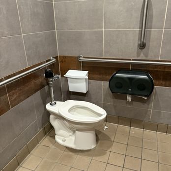 Bubba's 33 - Family restroom. Toilet seat is a weapon.  Needs to be replaced or fixed - Salad Near Me - Katy, Texas