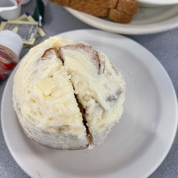 Pancake House - Giant Cinnamon Roll. there is NOTHING giant about this cinnamon roll. it's the size of a muffin. - Breakfast & Brunch Near Me - Mackinac Island, Michigan