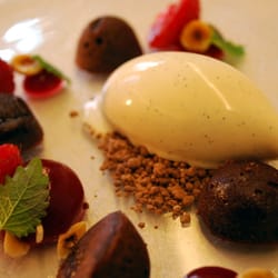 Frederiks Have Restaurant - Chocolate cake with vanilla ice cream, raspberries, and hazelnuts