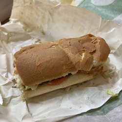 The two folded pieces of roast beef are barely visible in my sandwich.