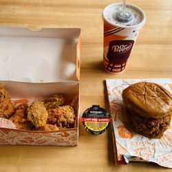 Popeyes Louisiana Kitchen - Hot Ones™ Darin' Dab Ghost Wings Served with Last Dab Ranch Dip, Smokin' Rojo  Chicken Sandwich, and a Dr Pepper®