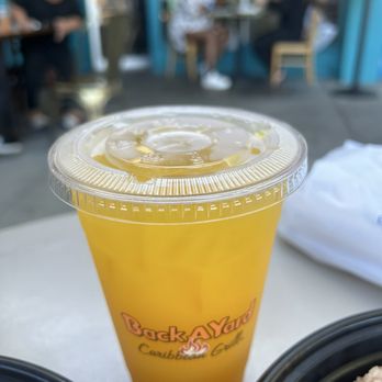 Back A Yard Caribbean American Grill - Mango Juice - American Near Me - Menlo Park, California