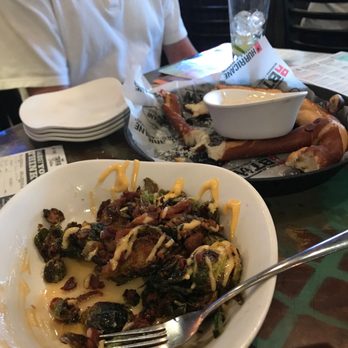 Hurricane Grill & Wings - Apps of Brussels sprouts and a pretzel and cheese sauce - Chicken Wings Near Me - Jacksonville, Florida Hurricane Grill & Wings - Apps of Brussels sprouts and a pretzel and cheese sauce - Chicken Wings Near Me - Jacksonville, Florida