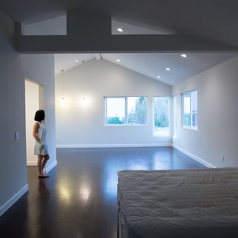 Garcia's Flooring - Bedroom with newly installed hardwood floor - Flooring Near Me