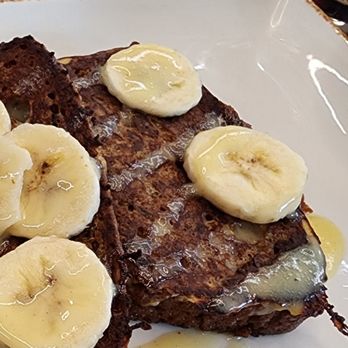 Brunch City Cafe - Very light drizzle of custard, you either need a side of it or drizzle more,syrup doesn't really go with banana bread - Breakfast & Brunch Near Me - Des Plaines, Illinois