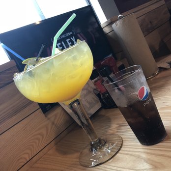 Arooga's - Comparison in size! Mango Peach Sangria bowl!!! - Sports Bars Near Me - East Brunswick, New Jersey