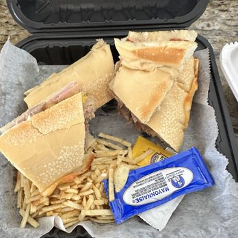 Pizzeria Del Gallo - Cuban sandwich after slicing at home. - Pizza Near Me - Cape Coral, Florida Pizzeria Del Gallo - Cuban sandwich after slicing at home. - Pizza Near Me - Cape Coral, Florida