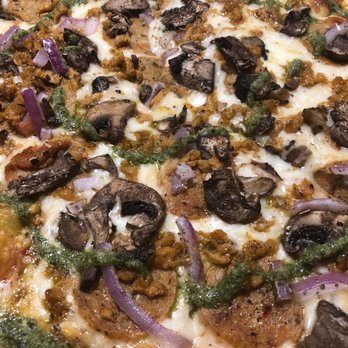MOD Pizza - Plant based sausage, jalapeño chicken sausage, red onions, mushrooms, crushed garlic, mozzarella, Asiago, Parmesan, oregano - Fast Food Near Me - Matthews, North Carolina
