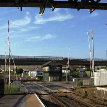 Newhaven Town - View of the level crossing from the platform. - Train Stations Near Me - Newhaven, ESX