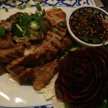 Tawan - Grilled pork with spicy sauce (Mhoy Yang) - Thai Near Me - Antwerp, VAN Tawan - Grilled pork with spicy sauce (Mhoy Yang) - Thai Near Me - Antwerp, VAN