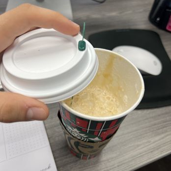 Starbucks - Haven't take a sip, didn't even pop the green stick off. About half empty and it's hot so no ice. - Coffee & Tea Near Me - Brandon, Florida Starbucks - Haven't take a sip, didn't even pop the green stick off. About half empty and it's hot so no ice. - Coffee & Tea Near Me - Brandon, Florida