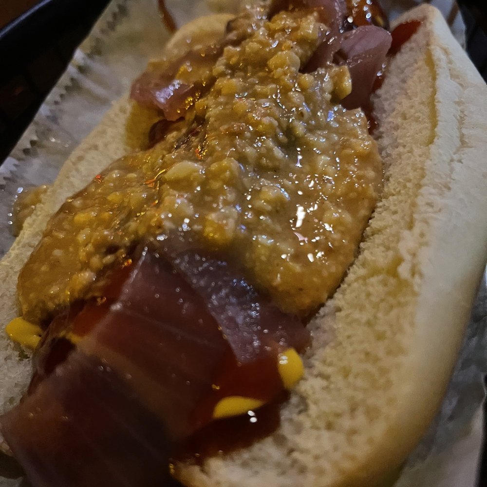 Happy Dog - The "Big Al" hotdog - house made peanut butter, habanero pickled red onions, ketchup, mustard and bbq - Bars Near Me - Cleveland, Ohio Happy Dog - The "Big Al" hotdog - house made peanut butter, habanero pickled red onions, ketchup, mustard and bbq - Bars Near Me - Cleveland, Ohio