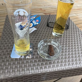 Hilton Garden Inn - First things first.  Two Peroni draft beers, some peanuts and of course, I nice cigar before enjoying Venice. - Hotels Near Me - Mestre, VE