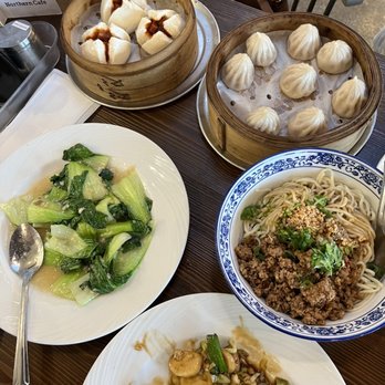 Northern Cafe - F9. Dan Dan Noodle E1. Juicy Pork Dumplings B12. Sauteed Bok Choy with Garlic D5. Shanghai Stir Fry Rice Cake with Chicken - Chinese Near Me - Irvine, California Northern Cafe - F9. Dan Dan Noodle E1. Juicy Pork Dumplings B12. Sauteed Bok Choy with Garlic D5. Shanghai Stir Fry Rice Cake with Chicken - Chinese Near Me - Irvine, California