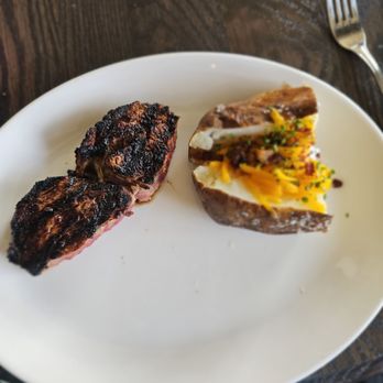 1933 Lounge - Split Ribeye and loaded potatoe - Cocktail Bars Near Me - Carmel, Indiana