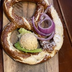 Max Bratwurst und Bier - Big pretzel with a cheese spread always hits the spot