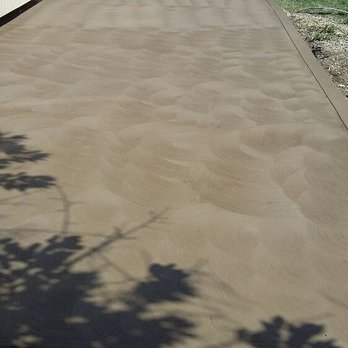 Wolverine Cement Construction - Broomed Swirl Patio - Masonry/Concrete Near Me Wolverine Cement Construction - Broomed Swirl Patio - Masonry/Concrete Near Me