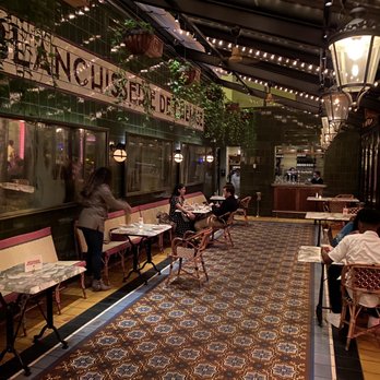 Le Diplomate - Quaint dining room with lots of distancing. - Brasseries Near Me - Washington, DC, District of Columbia