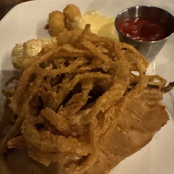 Doc Holliday's Roadhouse - Huge onions on prime ribs sandwichw. - Desserts Near Me - Galveston, Texas