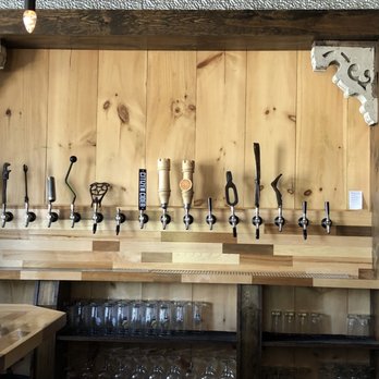 Hired Hand Brewing - a row of beer taps - Pizza Near Me - Vergennes, Vermont Hired Hand Brewing - a row of beer taps - Pizza Near Me - Vergennes, Vermont