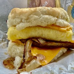McDonald's - Sausage, egg and cheese biscuit. Added grilled onions and breakfast sauce.