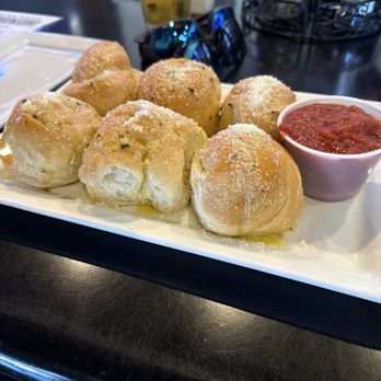 The Corner Pizza Bar - Garlic Knot appetizer. - Italian Near Me - Orlando, Florida The Corner Pizza Bar - Garlic Knot appetizer. - Italian Near Me - Orlando, Florida
