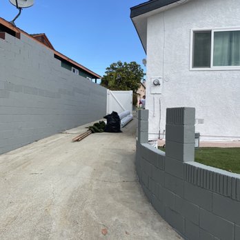 Super Painting - Painted this concrete wall grey. House white and trim black. - Painters Near Me - Los Angeles, California