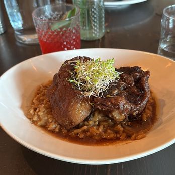 FINKA Table & Tap - BRAISED OXTAIL IN RED WINE REDUCTION / Mushroom Risotto - Asian Fusion Near Me - Miami, Florida FINKA Table & Tap - BRAISED OXTAIL IN RED WINE REDUCTION / Mushroom Risotto - Asian Fusion Near Me - Miami, Florida