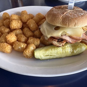 Blue Water Bar & Grill - Hawaiian Chicken Sandwich + tots. - American Near Me - Friday Harbor, Washington Blue Water Bar & Grill - Hawaiian Chicken Sandwich + tots. - American Near Me - Friday Harbor, Washington