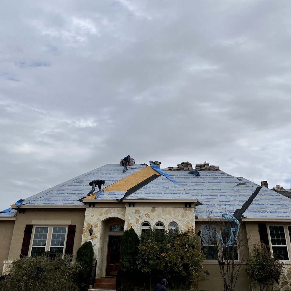 Slide of Wilson Roofing and Renovations