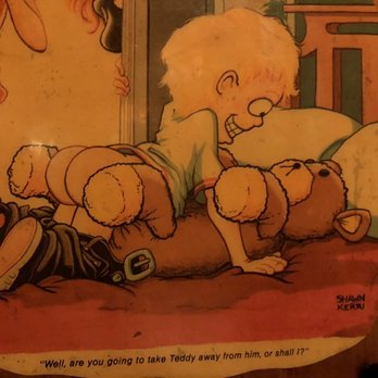 Boozgeois Saloon - a child playing with a teddy bear - Dive Bars Near Me - Fort Pierce, Florida