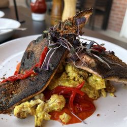 Chula Seafood Uptown - Pan-seared trout with yogurt-curry cauliflower and red pepper coulis