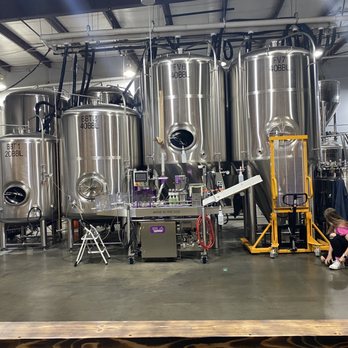 Meddlesome Brewing company - a woman working in a brewery - Breweries Near Me - Cordova, Tennessee